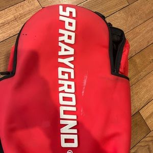 Awesome red rubber Sprayground backpack limited edition white letters